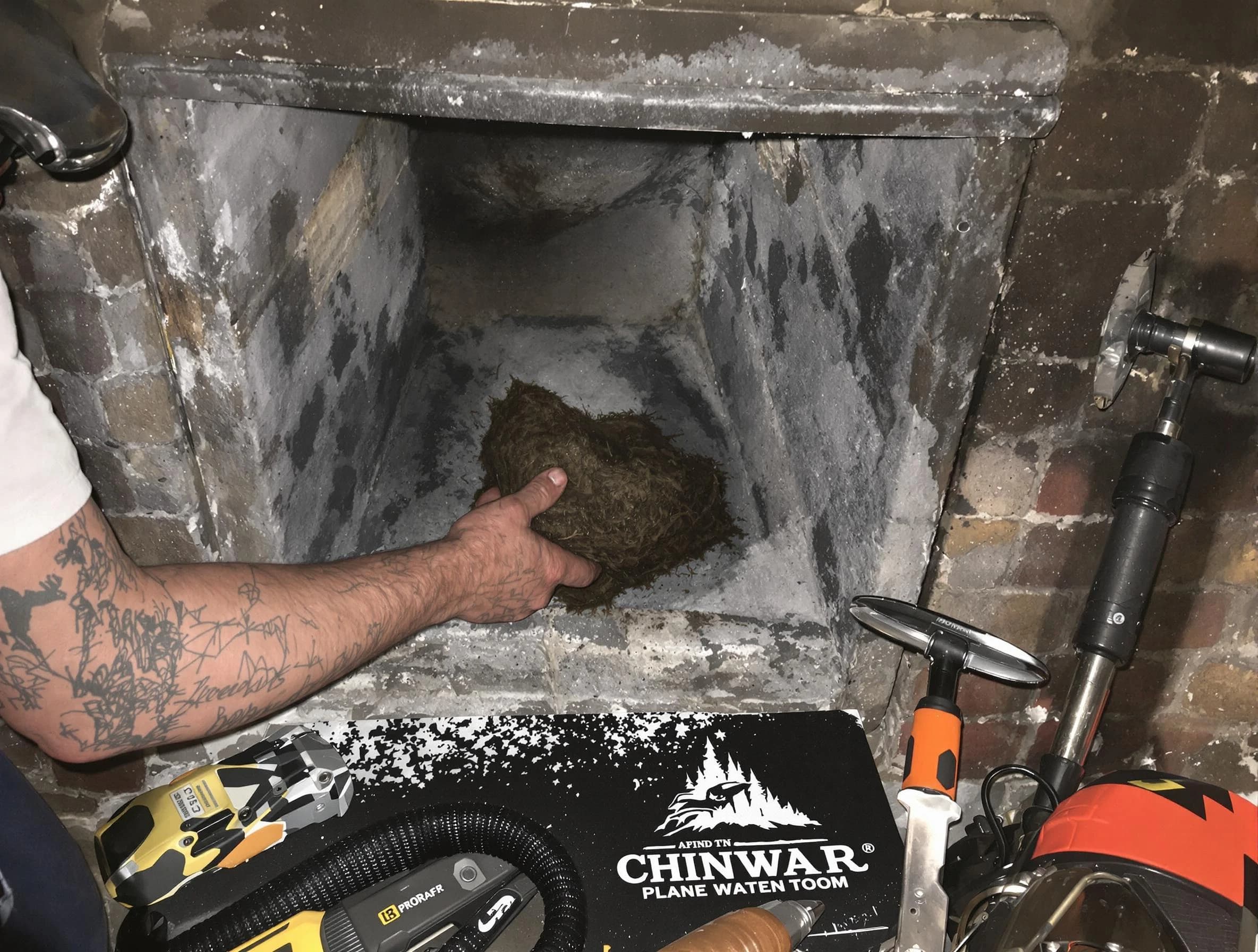 Hopewell Chimney Sweep safely removing debris and screening chimney in Hopewell, PA